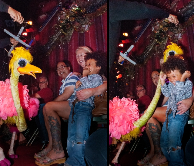 marionette ostrich gives boy a peck